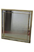 A contemporary moulded gilt framed wall mirror with bevelled edge plate and marginal surround, 64 cm