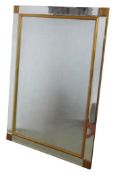 A contemporary rectangular wall mirror with bevelled edge plate and marginal surround, 105 cm x 74
