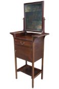 A Georgian style mahogany shaving/washstand with raised rectangular swing mirror back over a