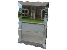 A large good quality contemporary cushioned-framed wall mirror, 117 x 81cm