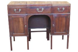A Gillows Lancaster mahogany washstand with rise and fall mirror flanked by hinged compartments over