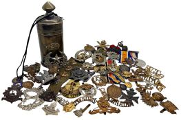 A large collection of various brass, silver, enamelled and other badges, medals, etc. to include a