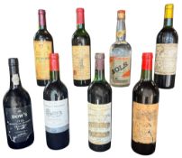 A collection of eight bottles of various wines, spirits and port to include a single bottle of Dow's