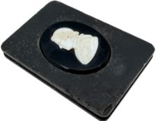 A Grand Tour glass cameo portrait of a Pope, the white glass cameo moulded in relief with the