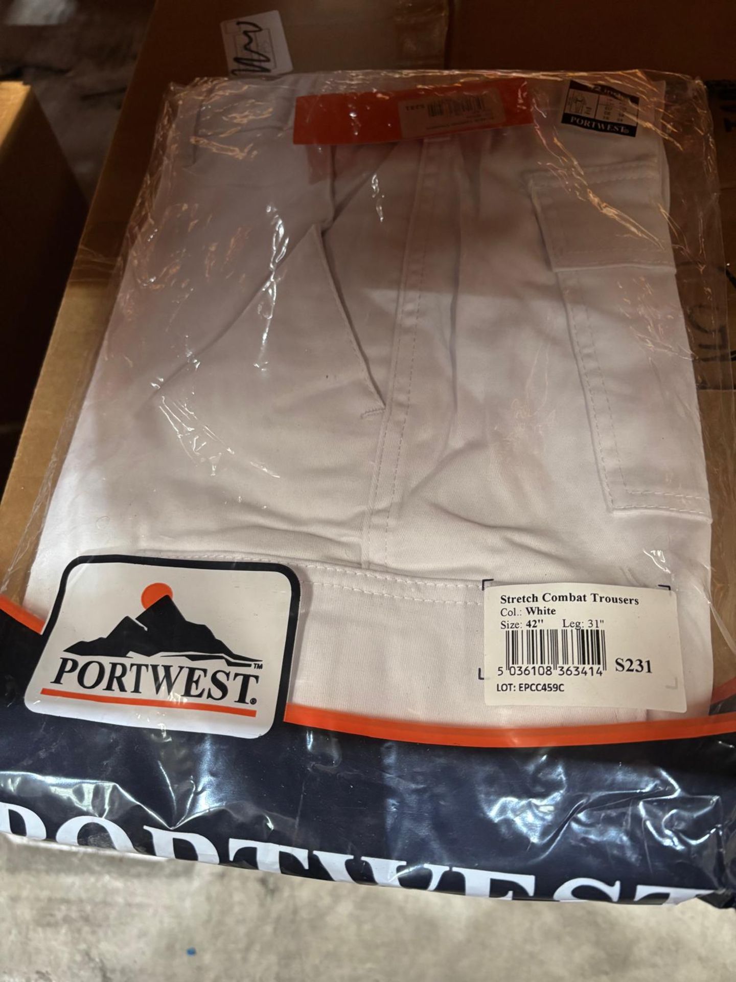 16 X NEW PACKAGED PORTWEST S231 STRETCH COMBAT TROUSERS. WHITE. SIZE 42" (LOC: 5.6-ZB158)