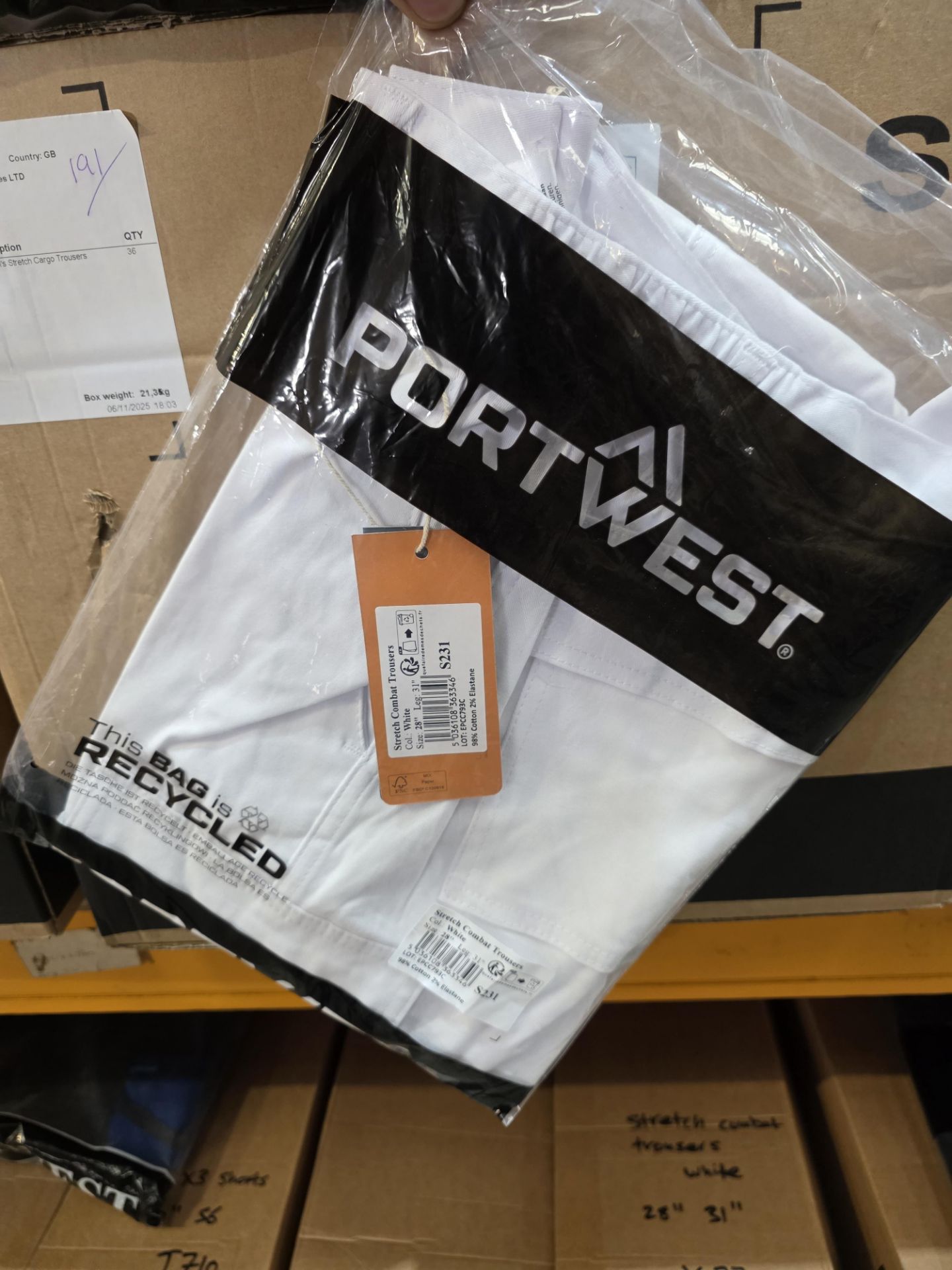11 X NEW PACKAGED PORTWEST STRETCH COMBAT TROUSERS SIZE 28'' 31 LEG. WHITE (LOC: 5.3-WW37)