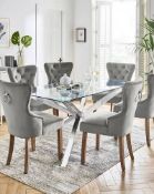 Bodie 6 Seater Dining Table The Bodie glass top dining table, finished with stainless steel legs (