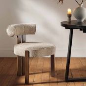 Boxed Ophelia Taupe Boucle Dining Chair RRP £249.99. Combining chic taupe boucle upholstery and