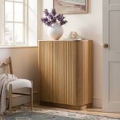 Boxed Maru Tall Cabinet, Oak RRP £499.99. Our Maru Tall Cabinet in Oak pairs architectural rhythm