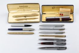 Sheaffer, six fountain pens, including a gold-plated Lady Sheaffer, a navy blue Imperial, a burgundy