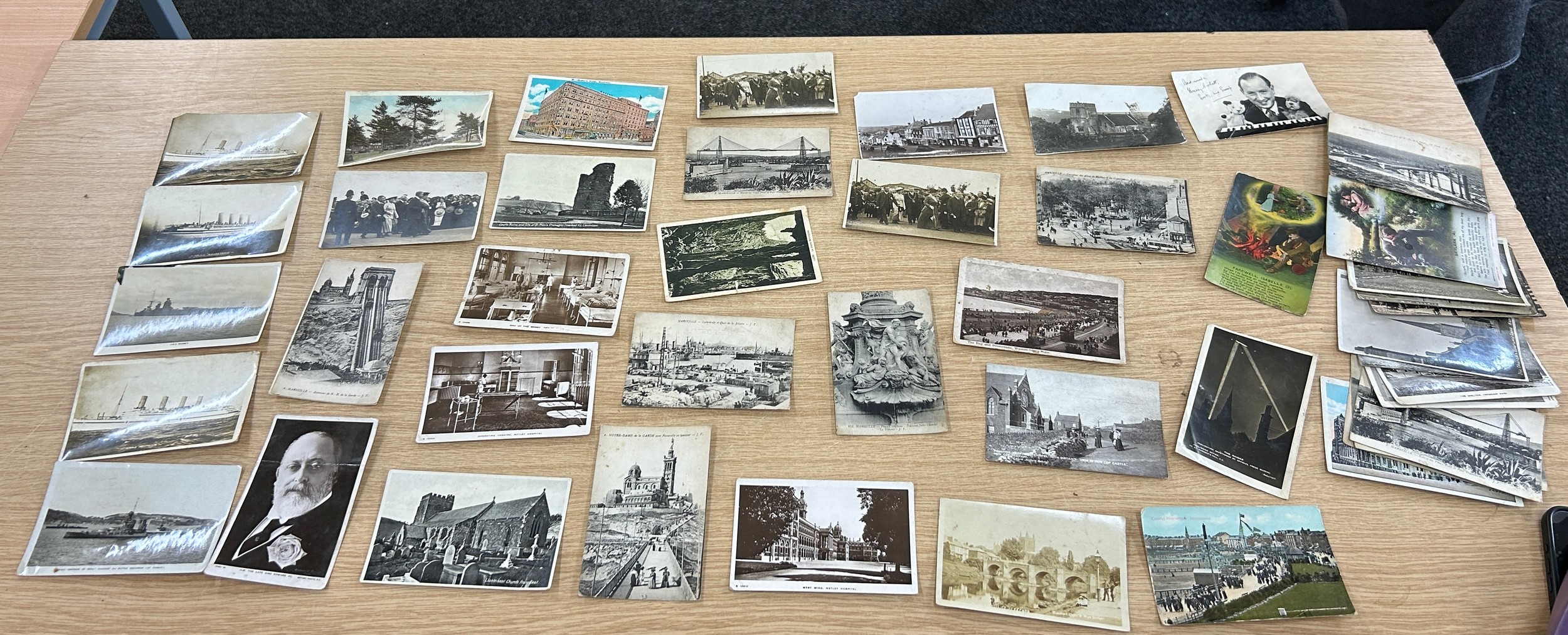 Collection of vintage British topographical postcards, primarily featuring scenic views and city