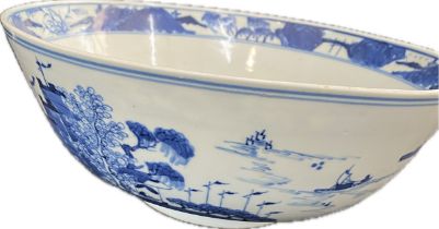 Antique Chinese blue and white porcelain bowl featuring a four-character Kangxi reign mark, diameter