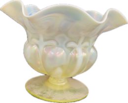 Vaseline glass vase measuring 7" x 10"