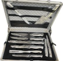 New and in its case collection of "Ultimate" kitchen knives to include 10 pieces in total