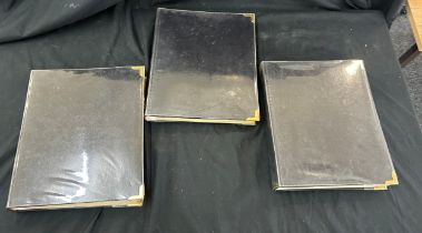 Three vintage photo albums containing steam locomotive photographs