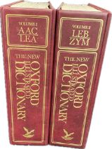 Two volumes of "The new oxford illustrated dictionary"