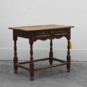 An oak side table 17th century and later