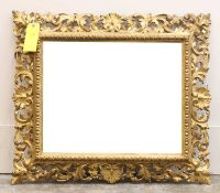 A Continental giltwood mirror Late 19th to early 20th century, in the Rococo taste