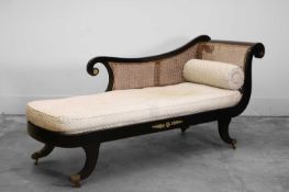 A Regency ebonised chaise lounge 20th century
