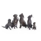 Michael Simpson (b.1959) A set of five small sitting dogs