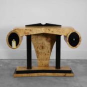 An Art Deco style maple and ebonised console table 20th century