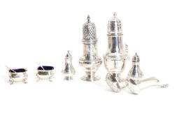 A collection of silver cruets