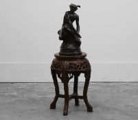 A seated bronze of Mercury 20th century