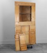 A pine corner cupboard, 19th century and later