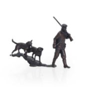 Michael Simpson (b.1959) A bronze huntsman with a shotgun and two Labrador retrievers figure group