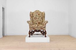 A carved walnut wing armchair in the 17th-century taste Late 19th/ early 20th century