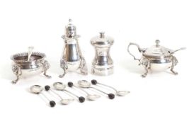 A silver cruet set