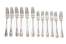 A collection of silver forks
