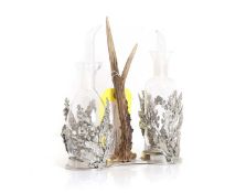A deer antler oil decanter holder 20th century