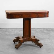An early Victorian mahogany fold over tea table 19th century