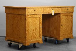 A Biedermeier satinwood pedestal desk 19th century