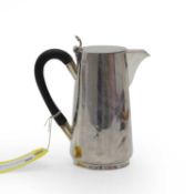 A silver hot water jug