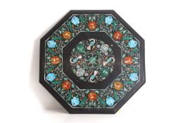 An octagonal floral marble inlay top Of recent manufacture