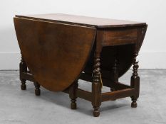 An oak gateleg dining table, Early 18th century and later