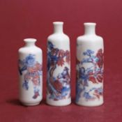 Three Chinese underglaze red and blue snuff bottles Late 20th century