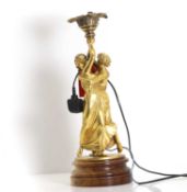 A gilt bronze figural torchiere 19th century