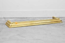 A Victorian brass curb fender Late 19th century