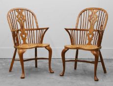 A pair of yew and elm Windsor chairs Of recent manufacture