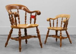 A yew and elm smoker's chair Of recent manufacture