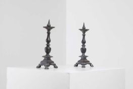 A pair of bronze pricket candlesticks 16th/17th century, Flemish