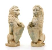 A pair of reconstituted stone armorial lions 20th century