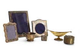 A group of silver items