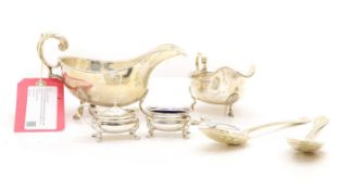 A group of silver items