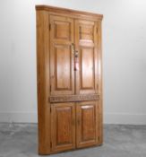 A George III pine corner cupboard Circa 1780