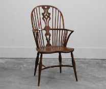 An elm and ash comb back Windsor chair mid 19th century