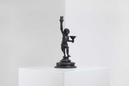 A bronze figural candleholder 19th century